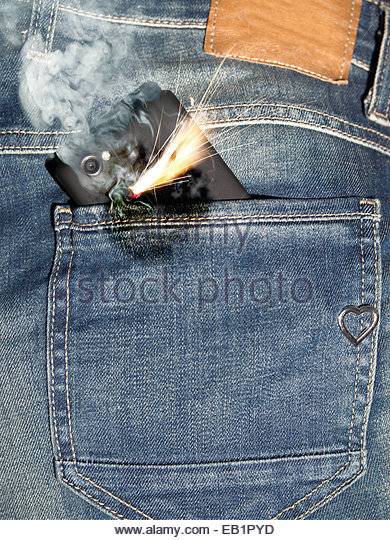 close-up-of-burning-phone-in-jeans-back-pocket-eb1pyd.jpg