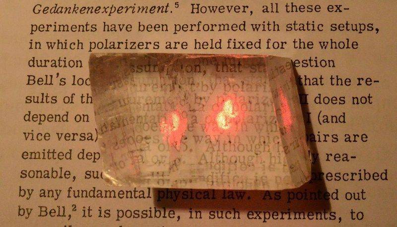 DSC_1475 Red laser through calcite crystal.jpg