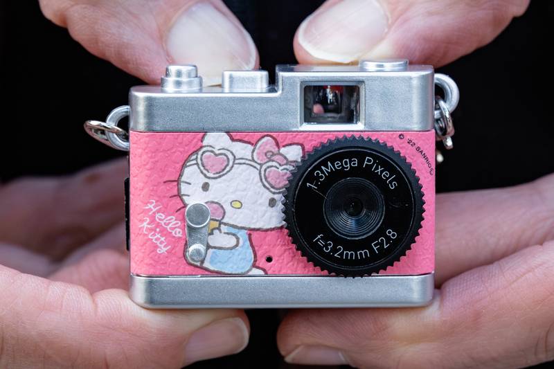 Hello-Kitty-camera-in-hands.jpg