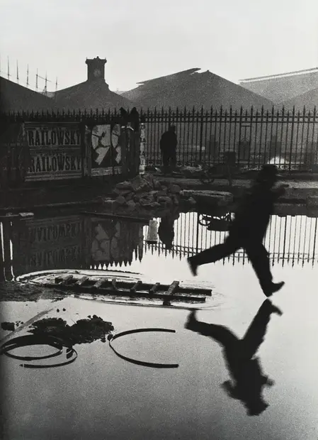 Henri-Cartier-Bresson-Behind-the-Gare-St-Lazare.webp