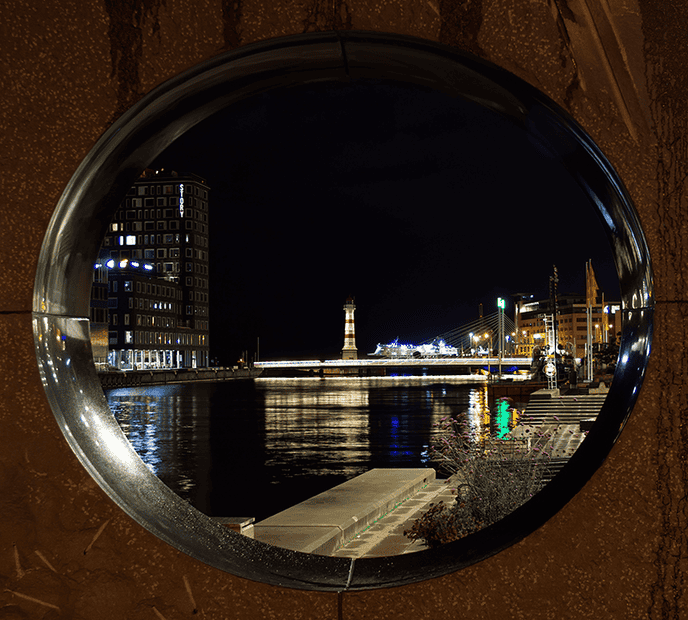 Lighthouse through a sculpture.png