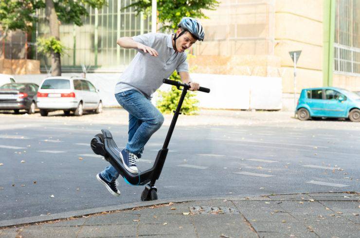 man-getting-into-a-scooter-accident-740x490.jpg