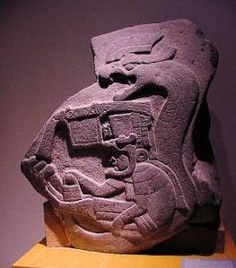 olmec-stone-carving-of-snake-and-human-figure-villahermosa-mexico.jpg