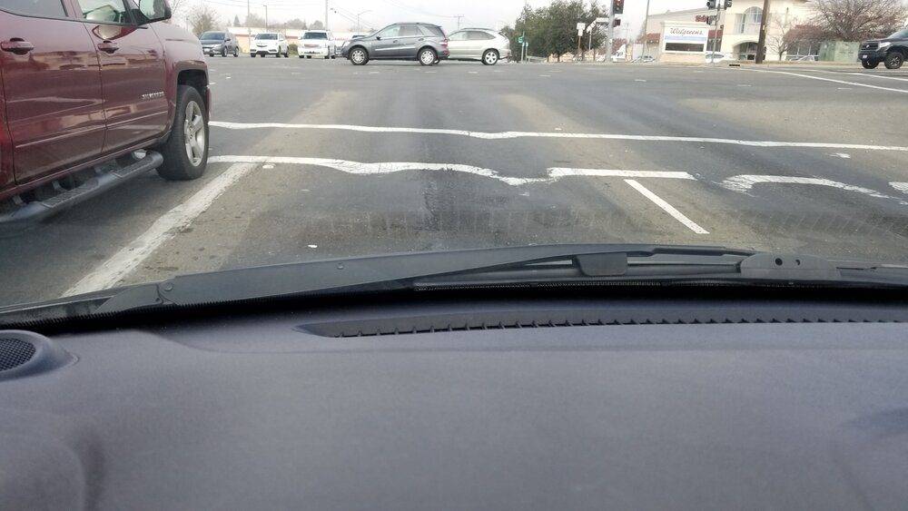 Physics-crosswalk line distorted by tires-20201224_113724.jpg