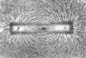 iron filings sprinkled-magnetic filed.png