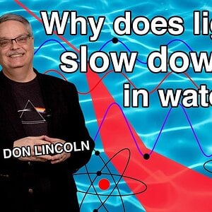 Why does light slow down in water?